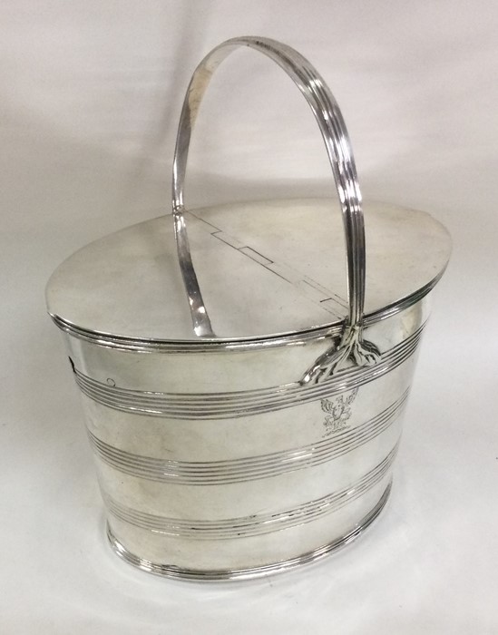 A good quality Georgian silver caddy with reeded s