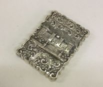 A rare cast silver castle top card case depicting