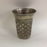 A Continental silver tapering beaker with textured