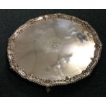 A large George III silver salver with chased borde