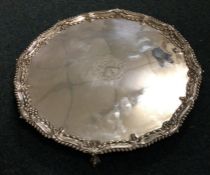 A large George III silver salver with chased borde