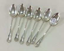 A set of six silver teaspoons with twisted termina