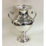 A good heavy two handled silver vase of baluster f