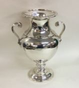 A good heavy two handled silver vase of baluster f