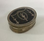 A silver and tortoiseshell inlaid jewellery box of