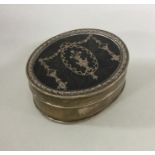 A silver and tortoiseshell inlaid jewellery box of