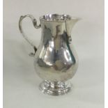 A Georgian silver sparrow beak pitcher cream jug o