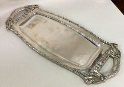 A large oval Austrian silver tray with shaped bord