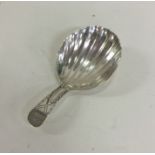 A George III silver caddy spoon with bright cut de