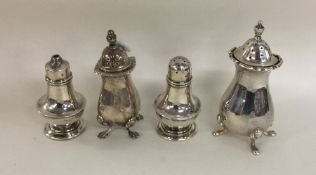 A collection of silver mounted peppers. Est. £30 -