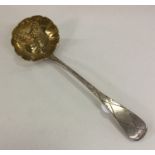 A good cast silver berry ladle engraved with flowe