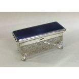 A silver and enamel mounted glass dressing table j