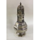 A heavy large shaped silver sugar caster. Birmingh