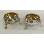 A good pair of engraved silver salts with gilt int