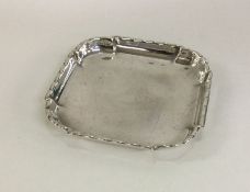 A stylish silver ashtray with cut corners. Birming