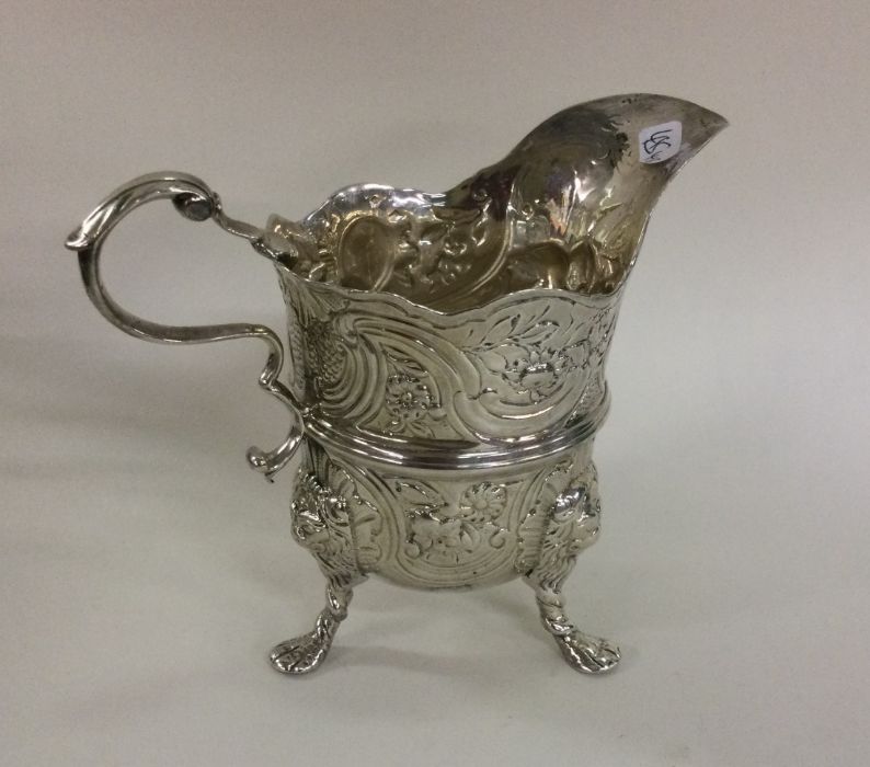 DUBLIN: A fine quality chased silver cream jug of - Image 2 of 3