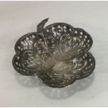 An Edwardian silver sweet dish in the form of a cl