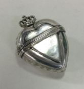 An 18th Century heart shaped silver marriage box w