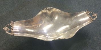 A stylish Continental silver fruit bowl with scrol