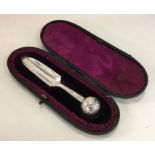 An attractive engraved silver cheese scoop decorat