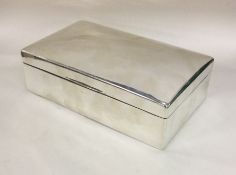 A good quality large silver domed top cigar box. B