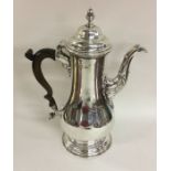 A good Georgian silver coffee pot of baluster form