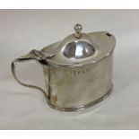 A good Georgian silver boat shaped mustard with re