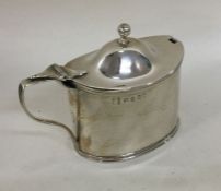 A good Georgian silver boat shaped mustard with re