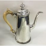 A good heavy Georgian silver bachelor's coffee pot