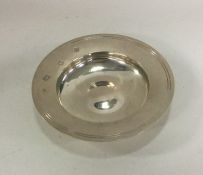 A heavy circular silver armada dish of typical for