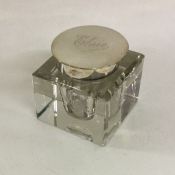 A silver mounted glass inkwell. Birmingham. Est. £