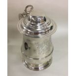 A good Georgian silver lidded tankard with crested