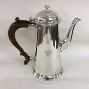 A good George II crested silver coffee pot of tape