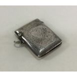 An engraved silver vesta case with hinged top. Bir
