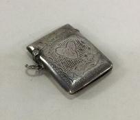 An engraved silver vesta case with hinged top. Bir