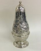 A rare and unusual chased sugar caster. London 187