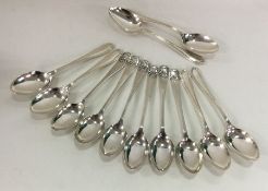 Two sets of six silver teaspoons. Various dates an