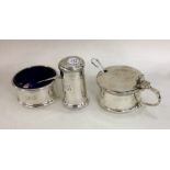 A heavy silver three piece cruet of circular form.