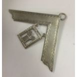 A Masonic silver square of typical form to loop to