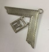 A Masonic silver square of typical form to loop to