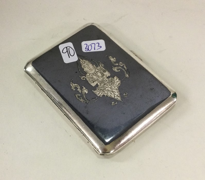 An Eastern silver and Niello cigarette case. Appro