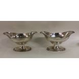 A pair of Adams' style shaped silver salts with be