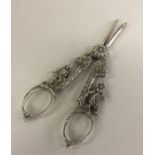 A good pair of silver grape scissors decorated wit