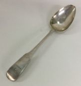 DUBLIN: A large Irish silver fiddle pattern spoon.