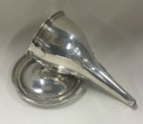 A rare Georgian silver wine funnel with reeded bor