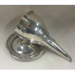 A rare Georgian silver wine funnel with reeded bor