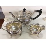 A heavy silver three piece tea service. Birmingham