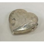 A large silver heart shaped box. 925 standard. App