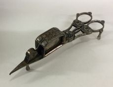 A pair of Old Sheffield plated candle snuffers. Es