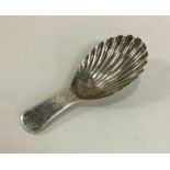 A good silver caddy spoon with fluted bowl. London